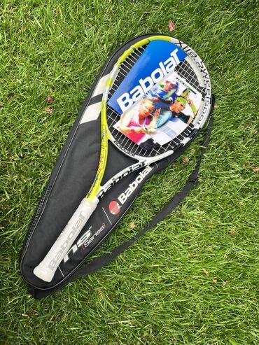 Ракетки: Теннисная ракетка Babolat XS 102 Yellow S. Белая рукоятка с обмоткой