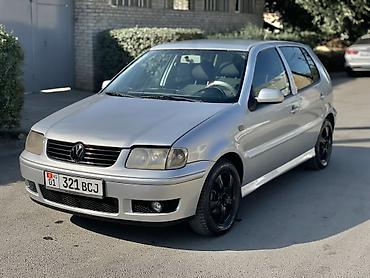 100 перохдка: Volkswagen Polo: 2001 г., 1.4 л, Механика, Бензин, Хэтчбэк — 2