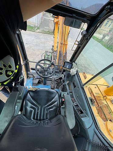 Экскаваторы: Экскаватор, Hyundai, 2012 г., Колесный — 8