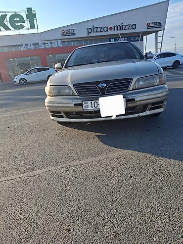 bmw e 38: Nissan Maxima: 3 l | 1999 il Sedan — 1