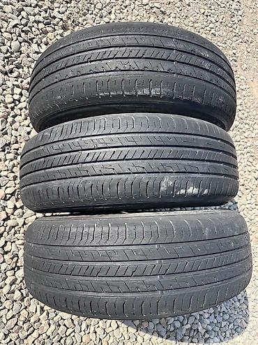 9 0016: 3 летних шин 215/65 R16 Пара хорошая одна слабая. - Количество: 3 — 3