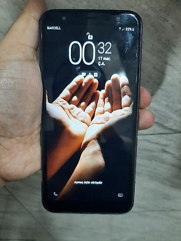 samaung j4: Samsung Galaxy J4 Plus, 64 GB, rəng - Qara, Barmaq izi — 1