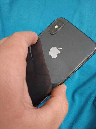 номер телефона ошка: IPhone Xs, Колдонулган, 64 ГБ, Black Titanium, Каптама, 76 %