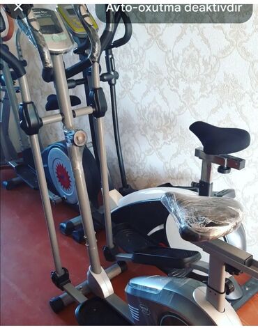 Перчатки: Şaquli velotrenajor və eliptik velosiped tipli fitnes trenajorları -