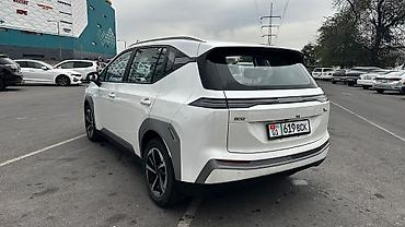 машина электрические: Электромобиль GAC Aion Y (кроссовер/MPV, 5 дверей), белый цвет кузова — 2