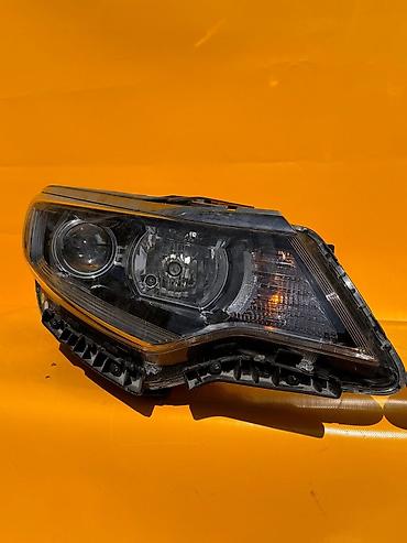 кью 05: Фара на KiA K5 — 2
