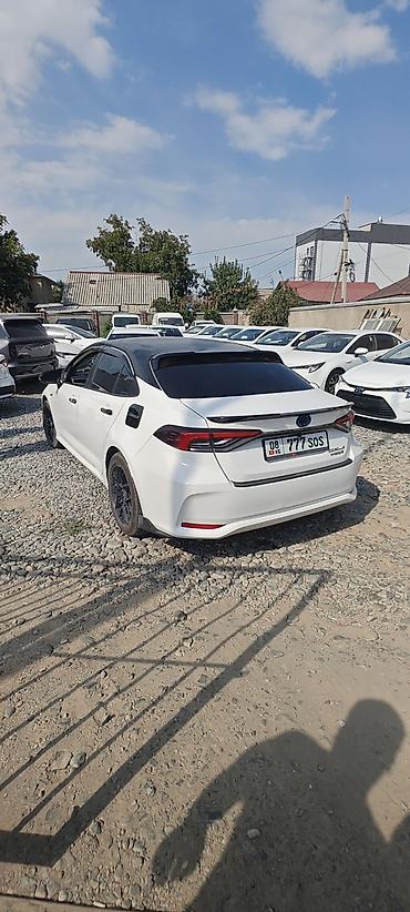 fit 2012: Toyota Corolla: 2021 г., 1.8 л, Робот, Гибрид, Седан — 2
