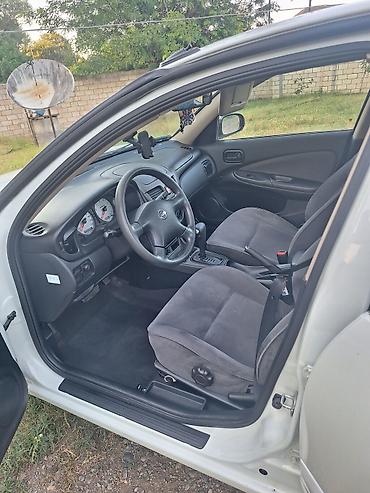 Nissan: Nissan Sunny: 1.6 l | 2007 il Sedan — 13