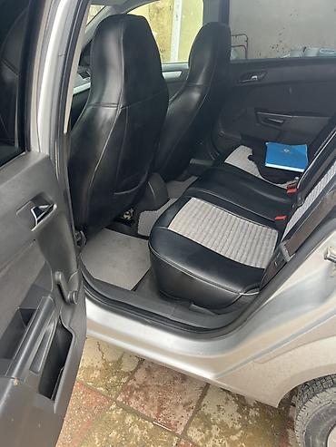 lada kalina 2008: Opel Astra Caravan (universall) – gümüşü rəng Xüsusiyyətlər: - Kuzov — 8