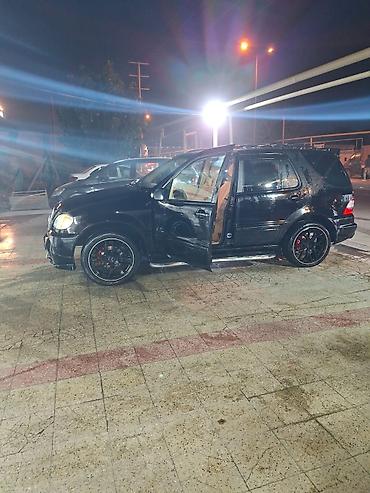 Mercedes-Benz: Mercedes-Benz M-Class (W163) SUV - Kuzov: qara rəng, şəhər və uzun — 9