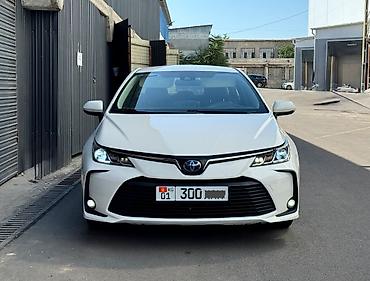 byd 06 ev: Toyota Corolla: 2021 г., 1.8 л, Вариатор, Гибрид, Седан — 2