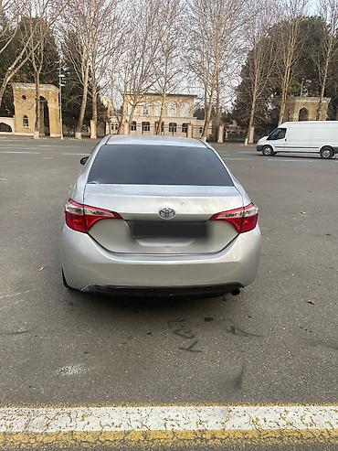 4 göz maşını: Toyota Corolla: 1.8 l | 2014 il Sedan — 4
