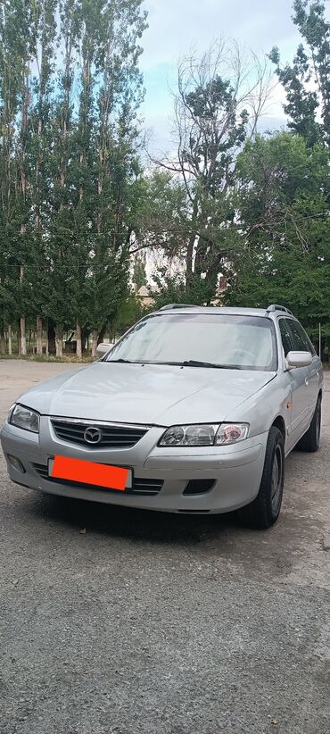 машина демио: Mazda Capella: 2001 г., 1.8 л, Механика, Газ, Универсал