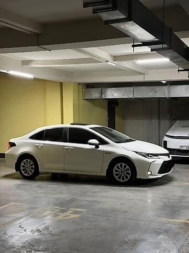 corolla 2016: Toyota Corolla: 2019 г., 1.8 л, Вариатор, Гибрид, Седан — 2