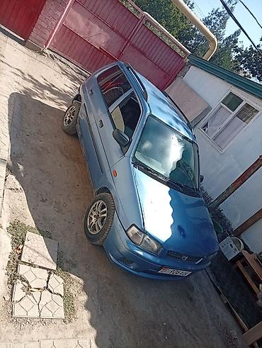 maxda demio: Mazda Demio: 1999 г., Механика, Хэтчбэк — 7