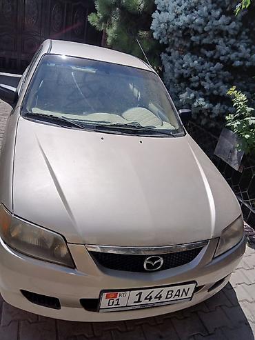 mazda 2000: Mazda Protege: 2001 г., Автомат, Седан — 1