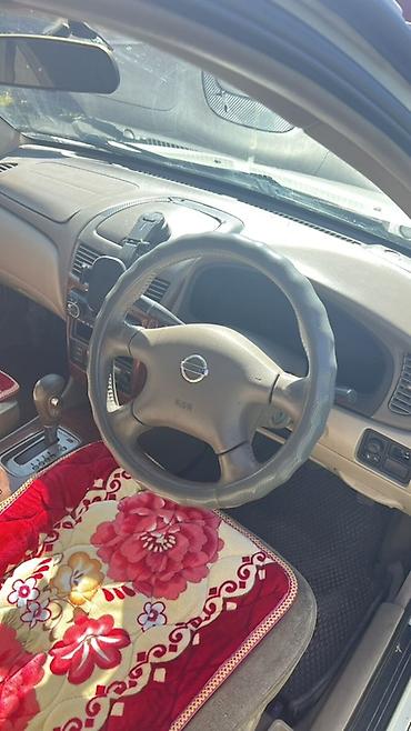 скутер suzuki: Nissan Sunny: 2004 г., 2 л, Автомат, Бензин, Седан — 4