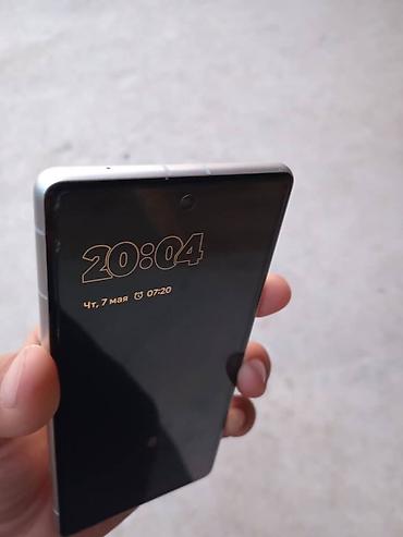 Google: Google Pixel 7a, Б/у, 128 ГБ, цвет - Белый, eSIM, 1 SIM — 5