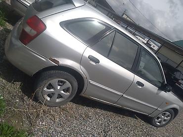 капот на нексия 2: Mazda Familia: 2001 г., Механика, Бензин, Хэтчбэк — 1