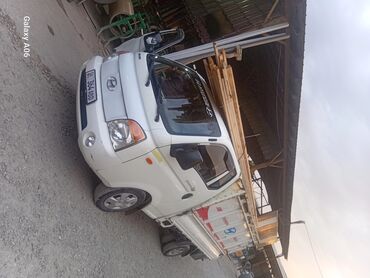 машина хундай соната: Грузовой автомобиль Hyundai Porter I белого цвета, оснащенный грузовой
