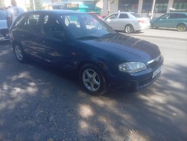 аудио касета: Mazda 323: 2000 г., Механика, Бензин — 4