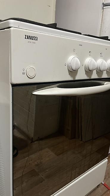 зануси: Газовая плита Zanussi ZCG 5500 - 4 газовые конфорки разного диаметра — 2
