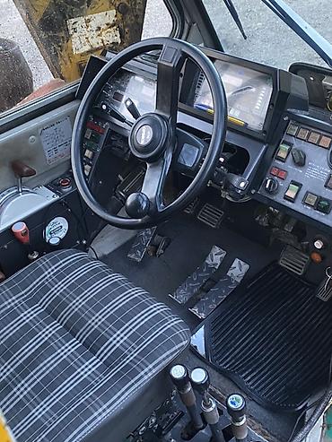 като кран: Автокран, 2001 г., от 30 м — 9