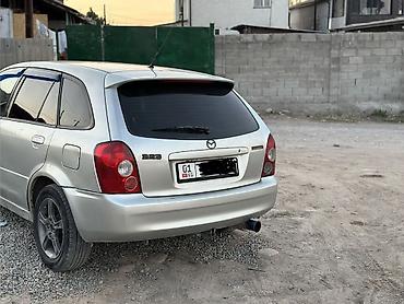 жук жабан: Mazda Familia: 2003 г., 1.6 л, Механика, Бензин, Универсал — 3