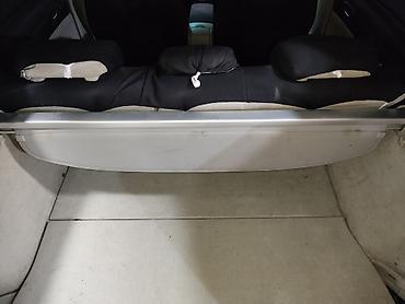 yük baqaji: Universal baqaj örtüyü/rollet (station wagon və həcmli baqajlı — 3