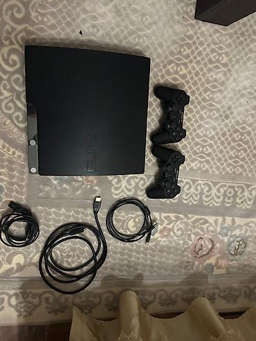 gta 5 pc: Sony PlayStation 3 (PS3) Slim oyun konsolu dəsti Paketə daxildir: - — 2