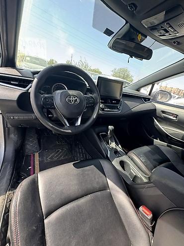byd e6: Toyota Corolla: 2021 г., 1.8 л, Автомат, Гибрид, Седан — 10