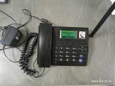 оборудование для ip телефонии без поддержки wi fi с цветным дисплеем: Телефонный аппарат с зарядкой
