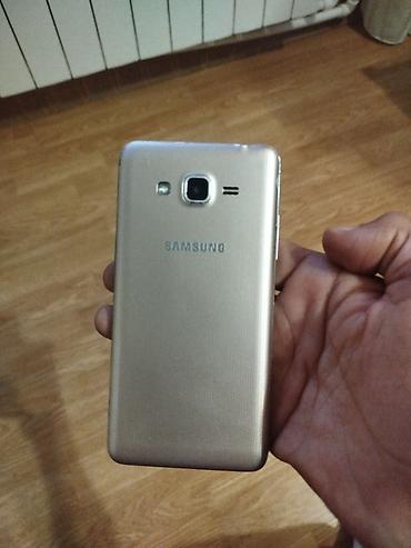 duymə kamera: Samsung Galaxy J2 Prime, rəng - Qızılı, İki sim kartlı — 1