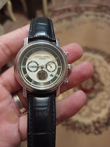bahalı saatlar: Klassik dizaynlı qol saatı - Brend işarələməsi: Patek Philippe Geneva — 1