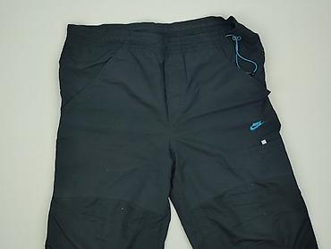 nike tech: Nike, Spodnie 3/4 dla mężczyzn, rozmiar M — 1