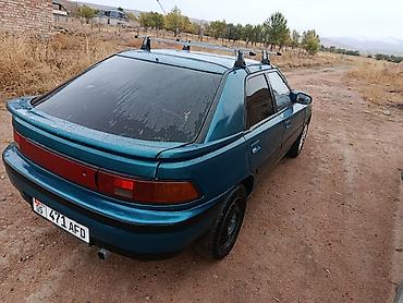 Mazda: Mazda 323: 1992 г., 1.6 л, Кол менен иштөөчү, Бензин, Хетчбек — 3