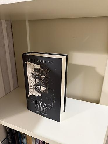 qzil saat: Məhsul: Kitab – “Beyaz Leke: Mahkumiyet” Müəllif: Aslı Arslan Dil — 1