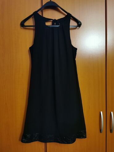 pantalone brkvalitrt sa dzepom sastrane: Crnja haljina, M veličina