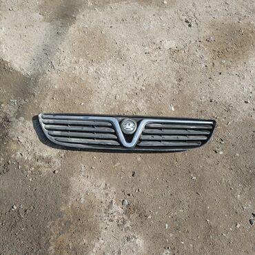 Решетки радиатора: Решетка радиатора Mazda Б/у — 4