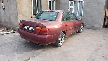 Транспорт: Mitsubishi Carisma: 1989 г., Автомат, Бензин, Седан — 3