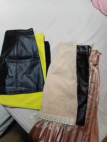 Kompleti: Set suknji – 4 komada, različiti stilovi i materijali - Crna mini — 14