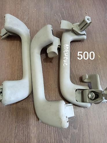 Другие детали салона: Салонные ручки — 10