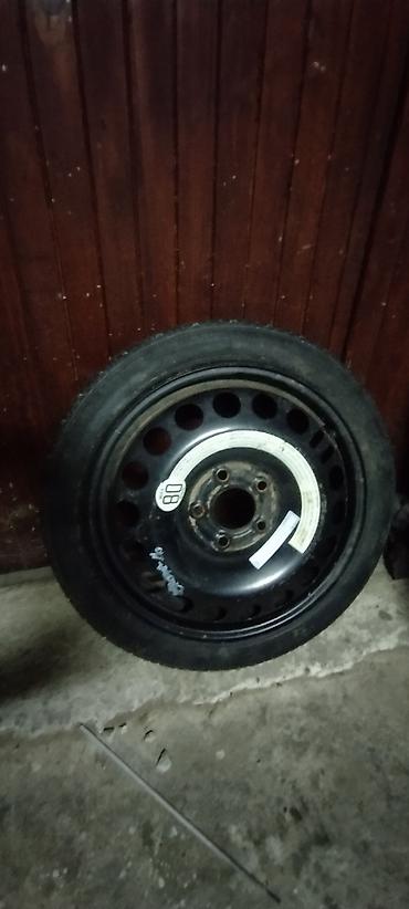 špr: Rezervni tocak copavac 115 70 16 sa continental gumom gotovo — 1