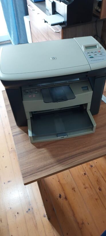 Printerlər: HP LaserJet M1005 MFP Ağ-qara printer Tam işləkdir, heç bir problemi