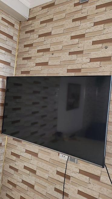 regular tv: Böyük ekranlı divar tipli televizor - Təxmini diaqonal: 55–65 düym — 1