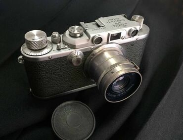 fotoaparat polaroid: Фотоапппарат " LEICA " . Германия . 1936 год . Коллекционный