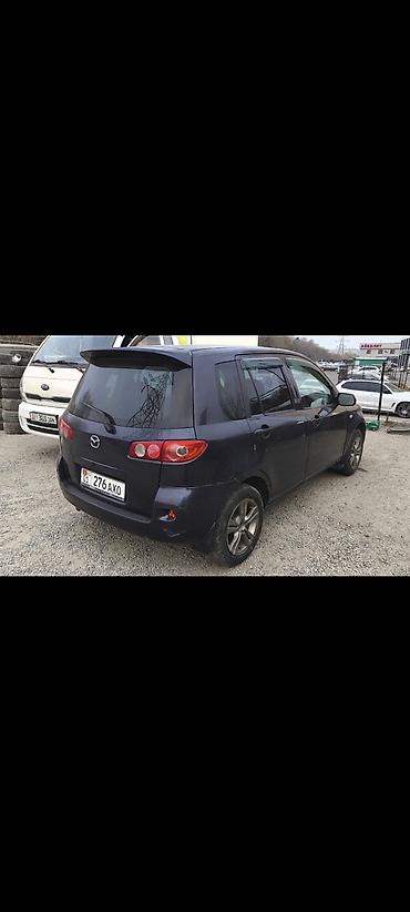 обмен на квартира: Mazda Demio: 2003 г., Автомат, Бензин — 6