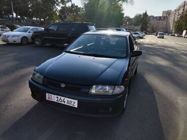 мазда 323 седан: Mazda 323: 1997 г., 1.3 л, Механика, Газ, Седан