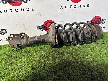 Амортизатор (передняя стойка в сборе с пружиной) правый для Volkswagen