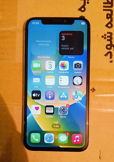2 ci el ipad: IPhone X, 64 GB, Matte Silver — 1